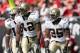 TAMPA, FL - NOVEMBER 5: Marques Colston #12 Terrance Copper #18 Reggie Bush #25 of the New Orleans Saints gets ready to move at the snap during the game against the Tampa Bay Buccaneers on November 5, 2006 at Raymond James Stadium in Tampa, Florida. The
