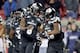 LOUISVILLE, KY - NOVEMBER 12: Lamar Jackson #8 and Brandon Radcliff #23 of the Louisville Cardinals celebrate after Radcliff ran for a touchdown during the game against the Wake Forest Deamon Deacons at Papa John's Cardinal Stadium on November 12, 2016 i