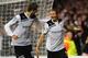 Peter Crouch congratulates Pavlyuchenko after one of his brace against Twente in the 2010-11 Champions League.