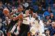 MINNEAPOLIS, MN - DECEMBER 6: Kawhi Leonard #2 of the San Antonio Spurs handles the ball against Andrew Wiggins #22 of the Minnesota Timberwolves during a game on December 6, 2016 at the Target Center in Minneapolis, Minnesota. NOTE TO USER: User express