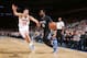 NEW YORK, NY - DECEMBER 2: Shabazz Muhammad #15 of the Minnesota Timberwolves handles the ball against Willy Hernangomez #14 of the New York Knicks during a game on December 2, 2016 at Madison Square Garden in New York City, New York. NOTE TO USER: User