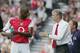LONDON - SEPTEMBER 11: Arsene Wenger of Arsenal talks with Patrick Vieira during the Barclays Premiership match between Fulham and Arsenal at Craven Cottage on September 11, 2004 in London. (Photo by Phil Cole/Getty Images)