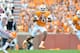 KNOXVILLE, TN - SEPTEMBER 12: Quarterback Josh Dobbs #11 of the Tennessee Volunteers gets chased out of the pocket during the first half of their game against the Oklahoma Sooners at Neyland Stadium on September 12, 2015 in Knoxville, Tennessee. (Photo by