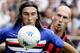 Genoa, ITALY: Sampdoria's forward Emiliano Bonazzoli (L) fights for the ball with AC Milan's defender Jaap Stam during their serie A football match Sampdoria-AC Milan at Marassi stadium in Genoa, 18 september 2005. Sampdoria won 2-1. AFP PHOTO / PACO SER