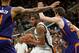 SAN ANTONIO,TX - DECEMBER 28: LaMarcus Aldridge #12 of the San Antonio Spurs drives on Dragan Bender #35 of the Phoenix Suns at AT&T Center on December 14, 2016 in San Antonio, Texas. NOTE TO USER: User expressly acknowledges and agrees that , by downl