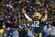 GREEN BAY, WI - JANUARY 08: Aaron Rodgers #12 of the Green Bay Packers reacts to a score against the New York Giants during the NFC Wild Card game at Lambeau Field on January 8, 2017 in Green Bay, Wisconsin. The Packers defeated the Giants 38-13. (Phot