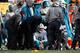 PITTSBURGH, PA - JANUARY 08: Matt Moore #8 of the Miami Dolphins receives attention on the sideline after taking a hit during the second quarter against the Pittsburgh Steelers in the AFC Wild Card game at Heinz Field on January 8, 2017 in Pittsburgh, Pe