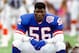 TAMPA, FL - JANUARY 27: Lawrence Taylor #56 of the New York Giants looks on during pre-game warm ups prior to playing the Buffalo Bills in Super Bowl XXV January 27, 1991 at Tampa Stadium in Tampa, Florida. The Giants won the Super Bowl 20-19. (Photo by