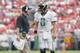 KANSAS CITY, MO - SEPTEMBER 15: Quarterback Mark Brunell #8 of the Jacksonville Jaguars listens to head coach Tom Coughlin during the NFL game against the Kansas City Chiefs on September 15, 2002, at Arrowhead Stadium in Kansas City, Missouri. The Jagua