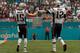 MIAMI GARDENS, FL - JANUARY 01: Tom Brady #12 and Chris Hogan #15 of the New England Patriots celebrate a touchdown during a game against the Miami Dolphins at Hard Rock Stadium on January 1, 2017 in Miami Gardens, Florida. (Photo by Mike Ehrmann/Getty I