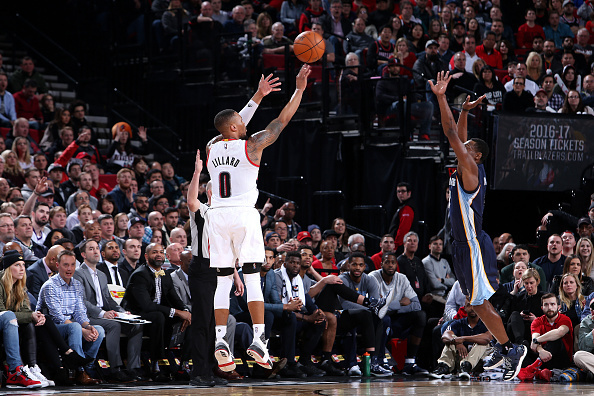 PORTLAND, OR - JANUARY 27: Damian Lillard #0 of the Portland Trail Blazers shoots the ball during the game against the Memphis Grizzlies on January 27, 2017 at the Moda Center in Portland, Oregon. NOTE TO USER: User expressly acknowledges and agrees that,