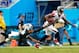 CHARLOTTE, NC - NOVEMBER 16: Josh Norman #24 of the Carolina Panthers dives after Julio Jones #11 of the Atlanta Falcons in the 3rd quarter during their game at Bank of America Stadium on November 16, 2014 in Charlotte, North Carolina. (Photo by Grant H