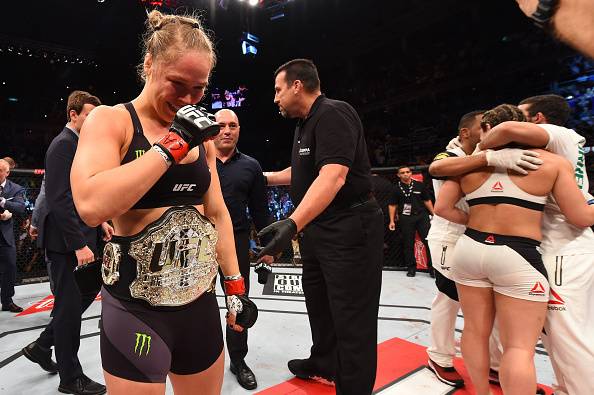 Rousey enjoying the last moments of her in-cage domination after knocking out Bethe Correia in August 2015.