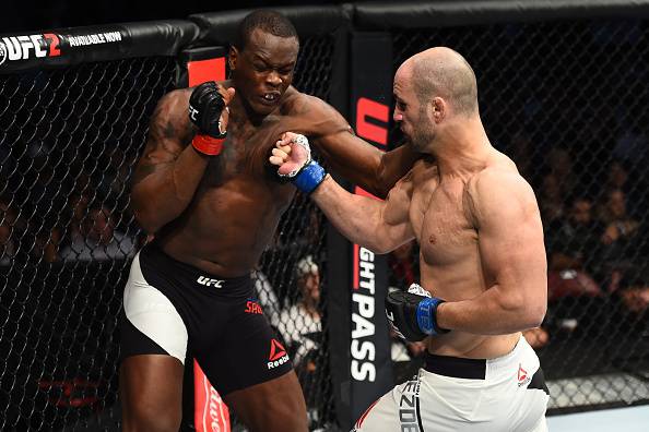 HOUSTON, TX - FEBRUARY 04: (R-L) Volkan Oezdemir of Switzerland punches Ovince Saint Preux in their light heavyweight bout during the UFC Fight Night event at the Toyota Center on February 4, 2017 in Houston, Texas. (Photo by Jeff Bottari/Zuffa LLC/Zuffa