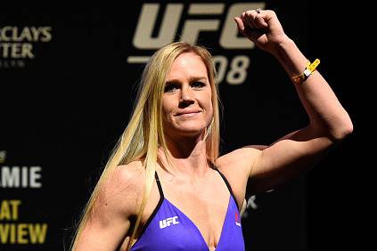 BROOKLYN, NEW YORK - FEBRUARY 10: Holly Holm steps off the scale during the UFC 208 weigh-in inside Kings Theater on February 10, 2017 in Brooklyn, New York. (Photo by Jeff Bottari/Zuffa LLC/Zuffa LLC via Getty Images)