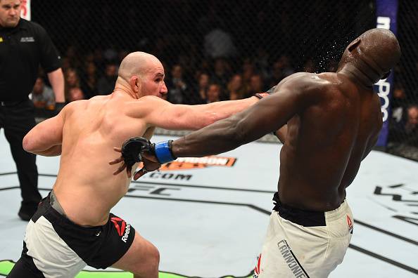 BROOKLYN, NEW YORK - FEBRUARY 11: (L-R) Glover Teixeira of Brazil punches Jared Cannonier in their light heavyweight bout during the UFC 208 event inside Barclays Center on February 11, 2017 in Brooklyn, New York. (Photo by Jeff Bottari/Zuffa LLC/Zuffa L