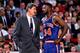 CHICAGO -1991: Charles Oakley #34 of the New York Knicks stares down Phil Jackson, head coach of the Chicago Bulls during an NBA game at Chicago Stadium in Chicago, Illinois in 1991. NOTE TO USER: User expressly acknowledges that, by downloading and or u