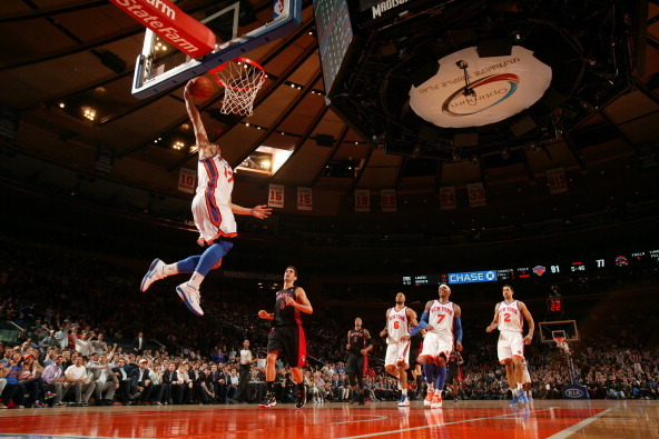 NEW YORK, NY - MARCH 20: Jeremy Lin #17 of the New York Knicks goes in for a dunk during the game against the Toronto Raptors on March 20, 2012 at Madison Square Garden in New York City. NOTE TO USER: User expressly acknowledges and agrees that, by down