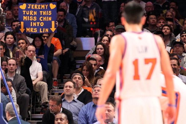 NEW YORK, NY - MARCH 20: (NEW YORK DAILIES OUT) A fan holds up a banner in reference to Jeremy Lin #17 of the New York Knicks during the game against the Toronto Raptors on March 20, 2012 at Madison Square Garden in New York City. The Knicks defeated the