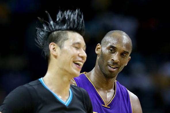 CHARLOTTE, NC - DECEMBER 28: Kobe Bryant #24 of the Los Angeles Lakers talks to Jeremy Lin #7 of the Charlotte Hornets during their game at Time Warner Cable Arena on December 28, 2015 in Charlotte, North Carolina. NOTE TO USER: User expressly acknowled