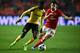 Dortmund's French forward Ousmane Dembele (L) vies with Benfica's midfielder Pizzi Fernandes during the UEFA Champions League round of 16 first leg football match SL Benfica vs Borussia Dortmund at the Luz stadium in Lisbon on February 14, 2017. / AFP / P