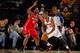 BOISE, ID - DECEMBER 26: Josh Owens #33 of the Idaho Stampede moves the ball against Fab Melo #41 of the Maine Red Claws during the NBA D-League game on December 26, 2012 at CenturyLink Arena in Boise, Idaho. Melo was on assignment from the Boston Celtic