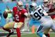 CHARLOTTE, NC - SEPTEMBER 18: Blaine Gabbert #2 of the San Francisco 49ers scrambles from Charles Johnson #95 of the Carolina Panthers in the 2nd quarter during their game at Bank of America Stadium on September 18, 2016 in Charlotte, North Carolina. (