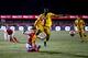 SUTTON, GREATER LONDON - FEBRUARY 20: Gabriel Paulista of Arsenal clears the ball under pressure from Bedsente Gomis of Sutton United during the Emirates FA Cup fifth round match between Sutton United and Arsenal on February 20, 2017 in Sutton, Greater L
