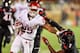 LUBBOCK, TX - OCTOBER 22: Joe Mixon #25 of the Oklahoma Sooners gets past Jah'Shawn Johnson #7 of the Texas Tech Red Raiders during the first half of the game between the Texas Tech Red Raiders and the Oklahoma Sooners on October 22, 2016 at AT&T Jones St