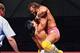 Ricky Steamboat lifts Randy Savage off the ground.