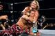 Chris Jericho grounds Shawn Michaels with a chinlock at WrestleMania XIX.