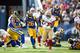 LOS ANGELES, CA - DECEMBER, 24: Carlos Hyde #28 of the San Francisco 49ers rushes up the middle during the game against the Los Angeles Rams at the Los Angeles Coliseum on December 24, 2016 in Los Angeles, California. The 49ers defeated the Rams 22-21. (P