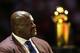 MIAMI, FL - DECEMBER 22: NBA Legend Shaquille O'Neal looks on with the championship trophy in the background at his number retirement ceremony on December 22, 2016 at American Airlines Arena in Miami, Florida. NOTE TO USER: User expressly acknowledges an