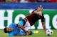 Roma's midfielder from Belgium Radja Nainggolan (R) clashes with Barcelona's Brazilian midfielder Rafinha during the UEFA Champions League football match between AS Roma and FC Barcellona at Rome Olympic stadium, on September 16, 2015 . AFP PHOTO /