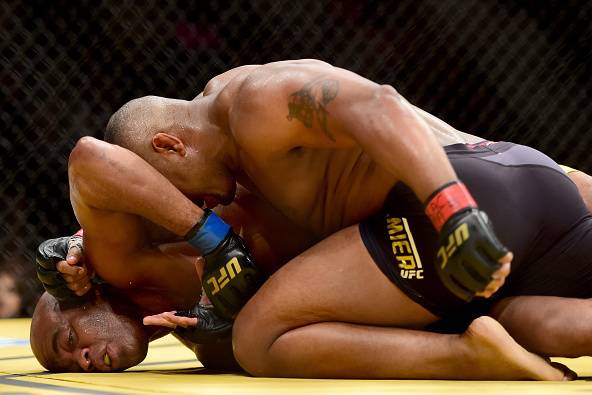 Cormier does punishing work from top position.
