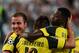 Ousmane Dembele and Raphael Guerreiro, here with Mario Gotze, are cornerstones of Dortmund's future.