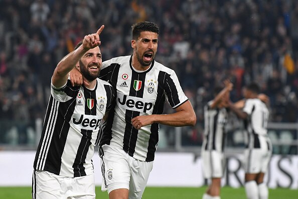 TURIN, ITALY - APRIL 08:  Gonzalo Higuain (L) of Juventus FC celebrates his second goal with team mate Sami Khedira during the Serie A match between Juventus FC and AC ChievoVerona at Juventus Stadium on April 8, 2017 in Turin, Italy.  (Photo by Valerio P