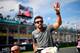 McLaren's Spanish driver Fernando Alonso takes part in the drivers parade prior to the start of the Formula One Australian Grand Prix in Melbourne on March 26, 2017. / AFP PHOTO / SAEED KHAN / --IMAGE RESTRICTED TO EDITORIAL USE - STRICTLY NO COMMERCIAL U