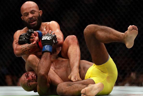 Johnson snatches Reis' arm for the fight-ending submission.