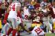 LANDOVER, MD - JANUARY 01: Running back Rob Kelley #32 of the Washington Redskins carries the ball against defensive tackle Damon Harrison #98 of the New York Giants in the first quarter at FedExField on January 1, 2017 in Landover, Maryland. (Photo by Ro