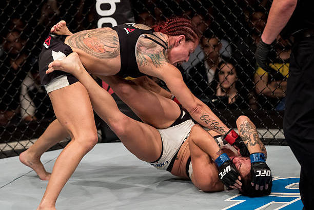 Cyborg blasts Lina Lansberg during their fight in September 2016.