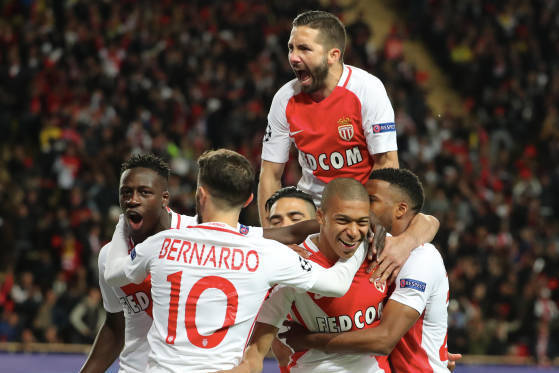 MONACO, MONACO - APRIL 19: Kylian Mbappe of AS Monaco celebrates his goal with teammattes during the UEFA Champions League Quarter Final second leg between AS Monaco and Borussia Dortmund at Stade Louis II on April 19, 2017 in Monaco, Monaco. (Photo by