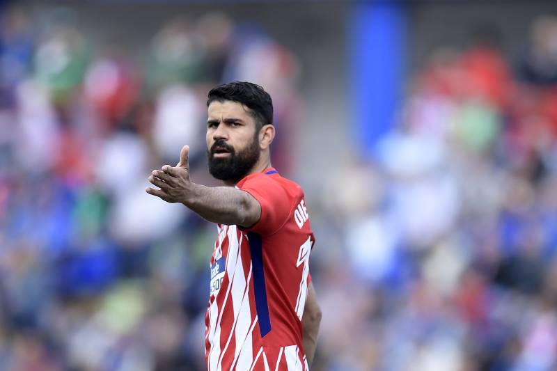 Atletico Madrid's Spanish forward Diego Costa gestures during the Spanish league football match between Getafe and Atletico Madrid at the Coliseum Alfonso Perez stadium in Getafe on May 12, 2018. (Photo by OSCAR DEL POZO / AFP) (Photo credit should