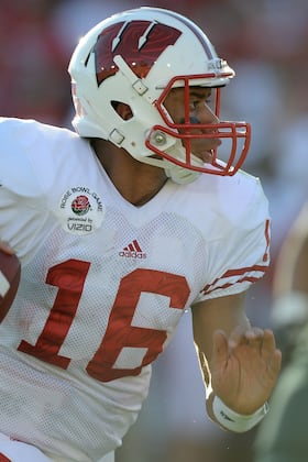 Wisconsin Quarterback Opts for Football Career