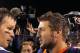 DENVER, CO - DECEMBER 18: Quarterback Tom Brady #12 of the New England Patriots talks with quarterback Tim Tebow #15 of the Denver Broncos after the game at Sports Authority Field at Mile High on December 18, 2011 in Denver, Colorado. The Patriots defeated the Broncos 41-23. (Photo by Doug Pensinger/Getty Images)