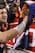 DENVER, CO - JANUARY 08: Quarterback Tim Tebow #15 of the Denver Broncos receives high fives from fans after defeating the Pittsburgh Steelers in overtime of the AFC Wild Card Playoff game at Sports Authority Field at Mile High on January 8, 2012 in Denver, Colorado. The Broncos defeated the Steelers in overtime 23-29. (Photo by Jeff Gross/Getty Images)