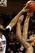 Kenton Walker II of the Gaels shown blocking Robert Sacre's shot in last year's WCC Championship game, which Gonzaga won.
