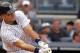 NEW YORK, NY - SEPTEMBER 24: Jesus Montero #63 of the New York Yankees hits an RBI single in the second inning against the Boston Red Sox on September 24, 2011 at Yankee Stadium in the Bronx borough of New York City. (Photo by Nick Laham/Getty Images)