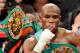 LAS VEGAS, NV - SEPTEMBER 17: Floyd Mayweather Jr. is carried in the ring by CEO of Mayweather Promotions Leonard Ellerbe as they celebrate Mayweather's fourth-round knockout of Victor Ortiz to win the WBC welterweight title September 17, 2011 in Las Vegas, Nevada. (Photo by Ethan Miller/Getty Images)