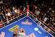 LAS VEGAS, NV - SEPTEMBER 17: (EDITORS NOTE: THIS IMAGE WAS TAKEN WITH A TILT-SHIFT LENS) Floyd Mayweather Jr. throws a right at Victor Ortiz in the fourth round during their WBC welterweight title fight at the MGM Grand Garden Arena on September 17, 2011 in Las Vegas, Nevada. (Photo by Al Bello/Getty Images)